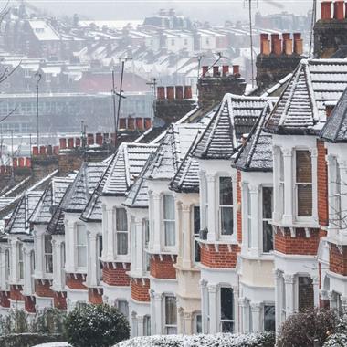 street of homes in winter