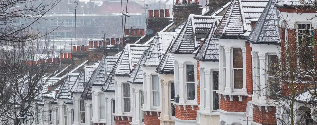 street of homes in winter